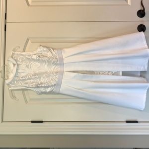 White lace detailed Eva Mendes dress